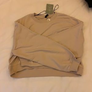 H&M pink “smile” cropped sweater